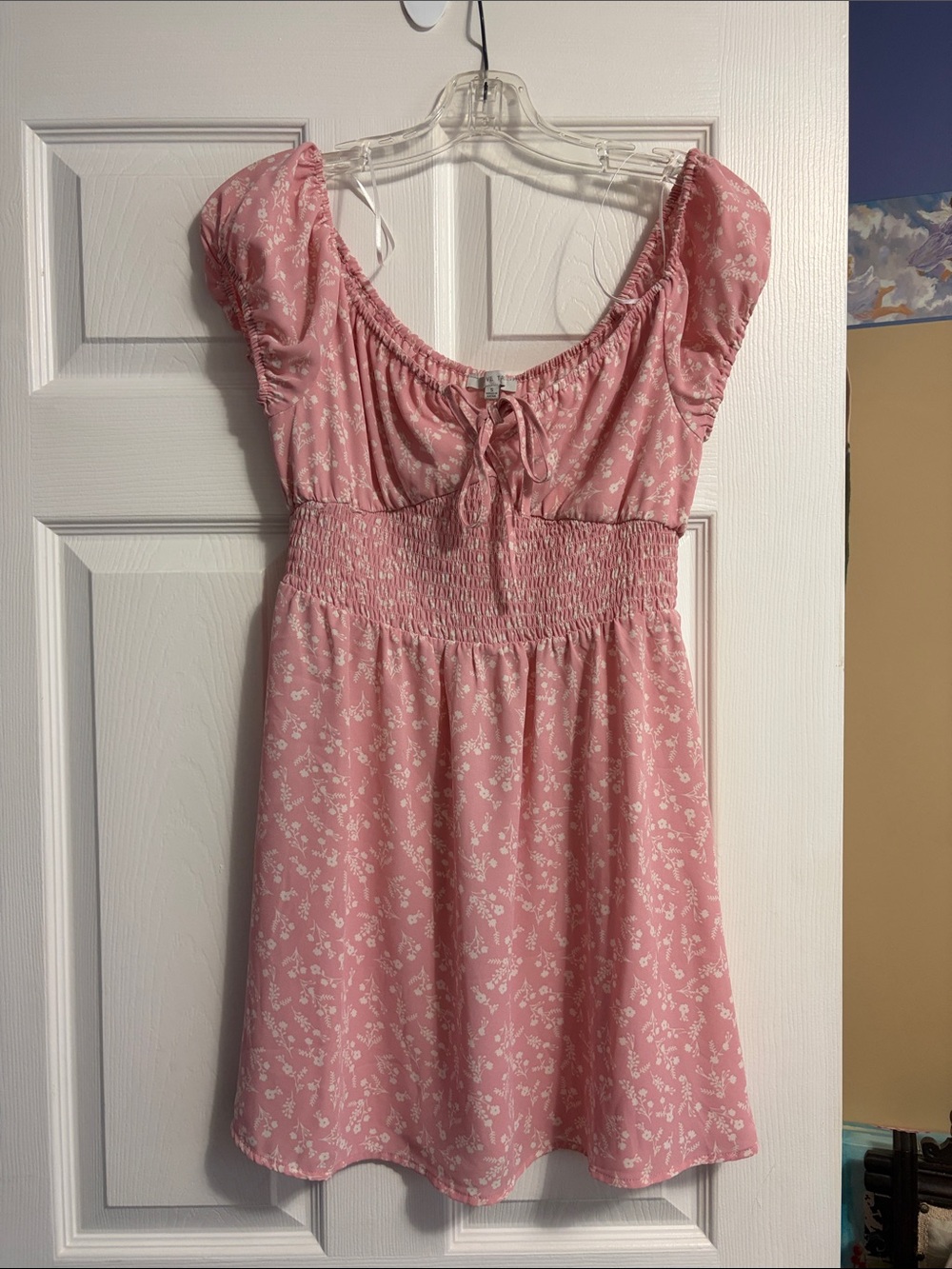 Light pink summer dress with white floral details